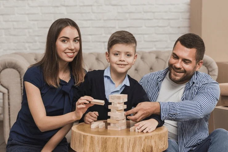 Family members play a game photo