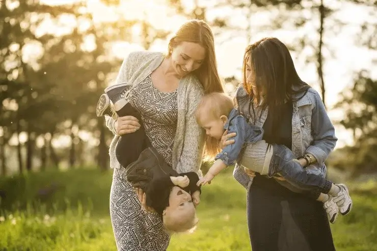 Family dressed in comfortable casual outfits for a relaxed photoshoot with coordinated colors and a natural, effortless look.