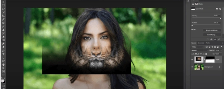 Applying the layer mask and aligning it with the model's face in Photoshop.