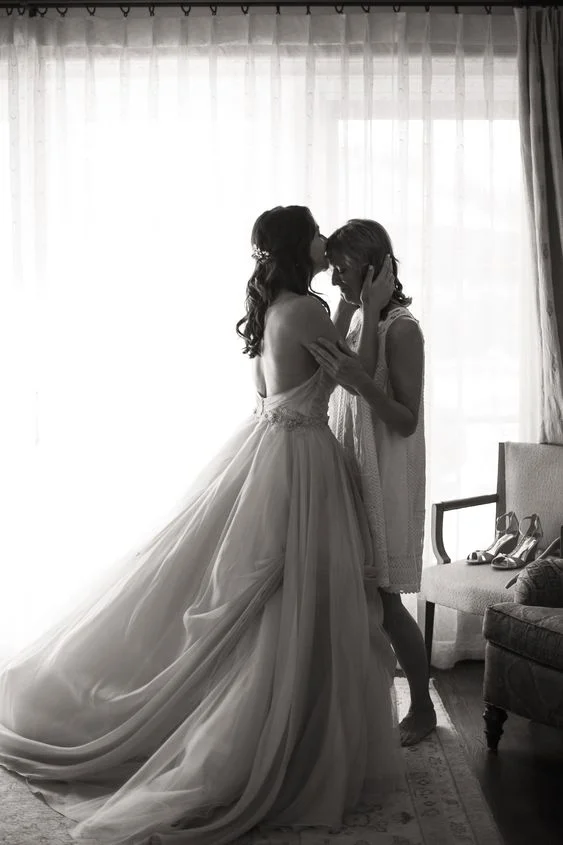 Forehead Kiss Mother and Daughter